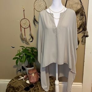 Caramela. Grey cover-up/wrap.